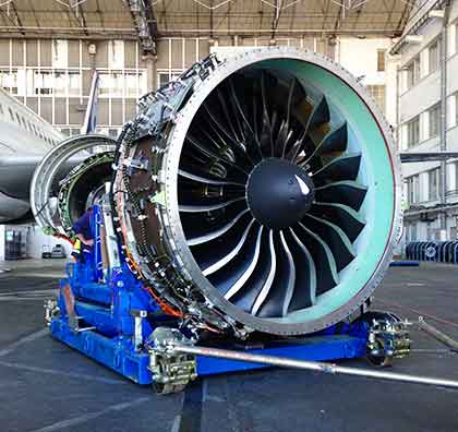 Dedienne Aerospace PW1100 engine stand in a workshop