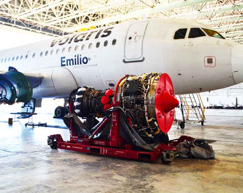 Dedienne Aerospace engine stand in a maintenance hangar