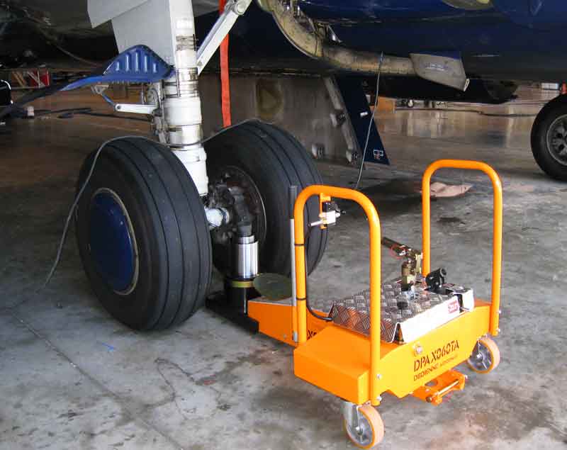 Dedienne Aerospace Axle Jack installed on a aircraft