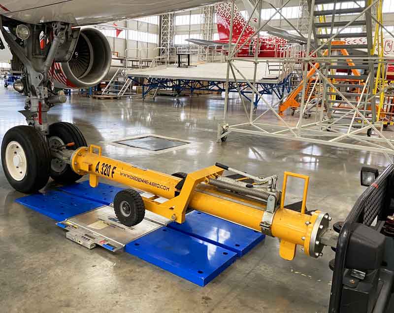 Dedienne Aerospace tow bar in a workshop